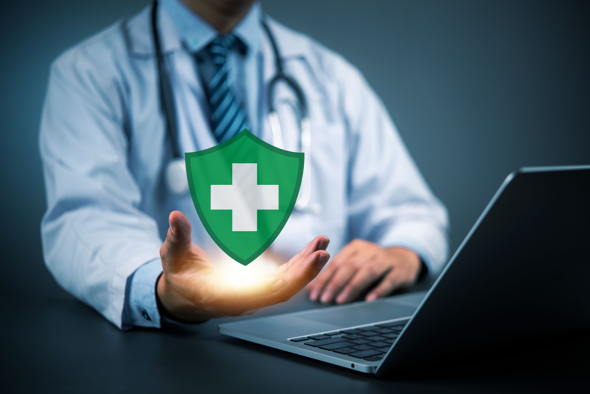 Healthcare protection concept with doctor displaying virtual shield, management secure medical insurance, data safety, and modern health security systems.digital health insurance services